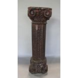 Good quality carved primitive Corinthian column with stained finish, 46cm high