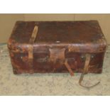 A vintage heavy gauge stitched brown leather suitcase, stamped Finnigan Maker Manchester (worn)