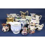 A collection of 19th century and later decorative jugs including a Masons Ironstone example with