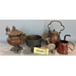 A collection of metal ware to include a graduated pair of three feet cauldrons by Wasbrough,