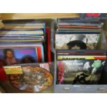 An extensive collection of mixed vinyl LPs to include T Rex, Lou Reed, Slade, T. Bone Walker,