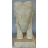 A good Indian carved marble study of a standing elephant, 36 cm high (tusks AF)