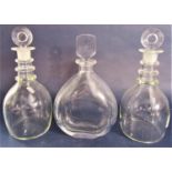 Orrefors Swedish glass decanter, 26cm high, together with a further pair of decanters (3)