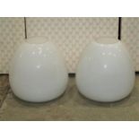 A pair of vintage milk glass domed shades, 28cm high