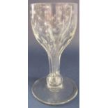 Good quality antique wine glass with star etched bowl and faceted stem, 14cm high