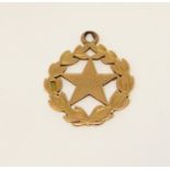 15ct medal with star framed by laurel leaves, 4g