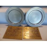 A pair of Brueghel brass engravers plates, each decorated with a fantasy scene, 18.5 x 23cm