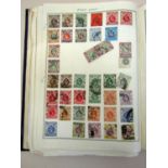 The Triumph Illustrated stamp album with a collection of old GB Commonwealth stamps. (displayed in