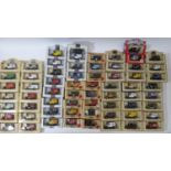 A collection of 64 boxed model vehicles by Lledo, mostly promotional Ford Model T vans,