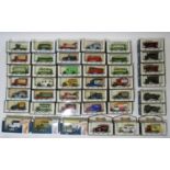 42 boxed model vehicles by Days Gone including buses, ambulances, bull-nosed Bedford vans,