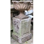 A reclaimed garden urn with acanthus leaf bowl and combined socle, raised on an associated square
