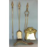 Set of three Victorian brass fire irons, embossed brass crumb tray and brush