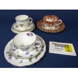 A collection of Cauldon tea wares with printed and infilled floral decoration comprising milk jug,