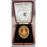 Royal Mint silver gilt knight bachelor award medal, with gilt pierced sword and ribbon decoration