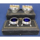 Cased pair of oval half fluted table salts, maker JR, Birmingham 1908, together with a further
