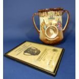 A Royal Doulton limited edition loving cup produced to commemorate the coronation of Queen Elizabeth
