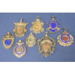 A collection of silver and silver enamel and gold applied medals, 3.5 oz approx (8)