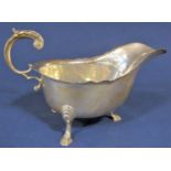 1960s Georgian style silver sauce boat with S scroll handle and cabriole hoof feet, maker JBC & S,