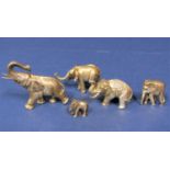 Collection of 925 silver miniature novelty characters of standing elephants, the largest 4 cm, 3.5