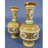 A pair of early 20th century Mettlath vases with incised and painted decoration including cartouches