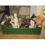 Two boxes of homo erotica figure groups and carvings, mixed materials