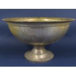 A massive silver plated fruit or punch bowl, with flared rim, upon a stepped circular base, 50cm