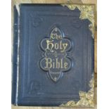 A large 19th century National Comprehensive Family Bible with coloured illustrations, maps, etc,