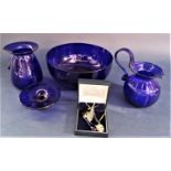 A collection of Bristol Blue glassware to include a bowl, pin dish, small jug, small vase and a