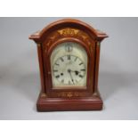 Edwardian inlaid walnut bracket type clock, the arched engraved dial with silent chime subsidiary