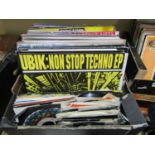 A box containing a mixed collection of vinyl LPs, EPs and 45 rpm singles, together with a book