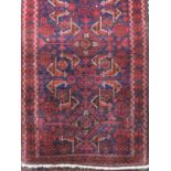 Afghan village rug decorated with still life's of chickens and medallions upon a blue and red