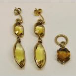 Pair of yellow metal faceted citrine drop earrings, 4.5cm L approx and a similar oval pendant, 8.