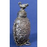 Sterling import silver scent bottle embossed with creatures amidst scrolled foliage in cartouche,