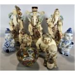 A collection of Chinese carved bone figures of immortals, each 12cm high approx; together with a