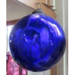 A large blue glass witches ball, 25cm diameter approx
