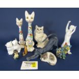 A Royal Doulton model of a seated long furred white cat, a further Royal Doulton model of a cat from