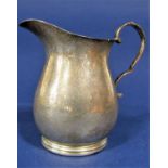 1930s cast silver baluster cream jug, with S scroll handle, Sheffield 1936, 11cm high, 6oz approx