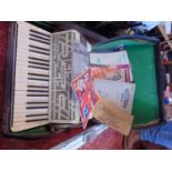 Hohner cased piano accordion with sheet music