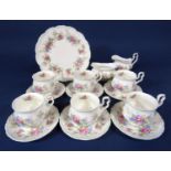 A collection of Royal Albert Colleen pattern teawares comprising milk jug, sugar bowl, cake plate,