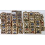 A collection of 61 boxed vans by Lledo including 34 Stevelyn 'View Vans' advertising holidays and