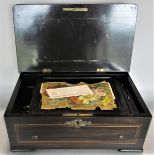 Swiss rosewood and boxwood inlaid cased music box, with card inside inscribed National Music Box,