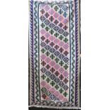 A Qashgai kelim with geometric banded decoration in various colours, 195 x 95 cm
