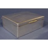 Silver cigarette box with cedar lined interior, hallmarks worn, 11.5 cm wide (dents to lid)