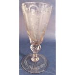 Good quality antique glass chalice or tapered goblet, the bowl with floral and other faceted