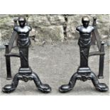 A pair of heavy cast iron andirons in the form of classical male half torsos, raised on entwined