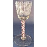 A good quality cordial type goblet with etched garland and other bands, coloured latticino stem