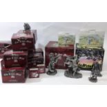 A collection of boxed pewter figures from The Tudor Mint including 'Lord of the Rings' Black Rider