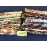 Large collection of upholstery fabric remnants, mainly cottage floral prints including some by