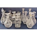 A large collection of decanters and stoppers (14)