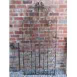An ironwork pedestrian gate with decorative scrollwork detail 87 cm wide (including hinge) 181 cm